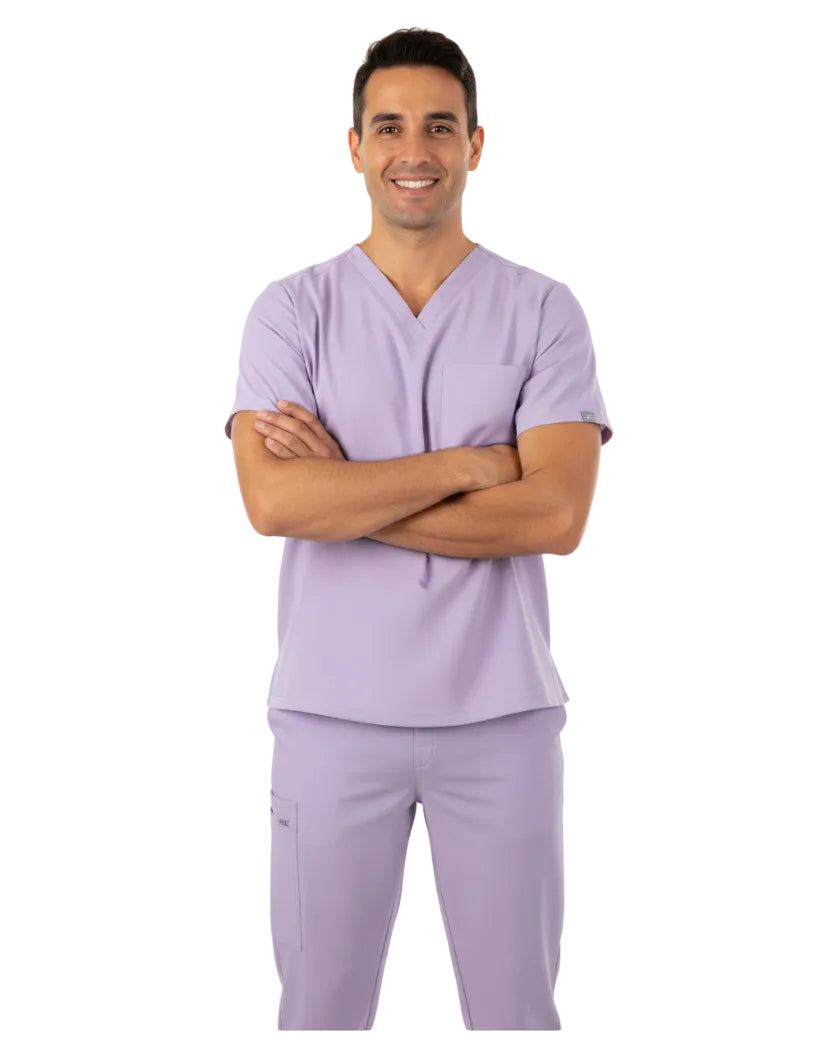 Lavender scrub set with top and pants on a white background