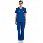 Person wearing a blue scrub set with a stethoscope on a white background