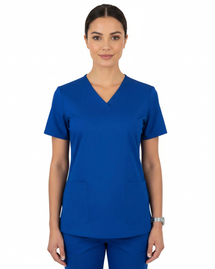 Woman wearing a blue scrub top on a white background