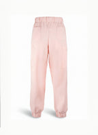 Pink scrub pants on a white background