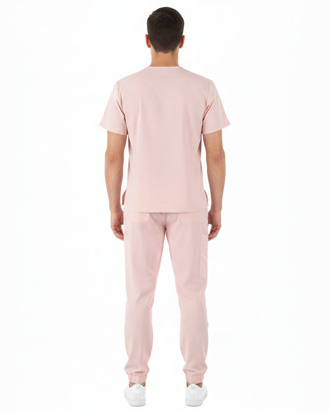 Light pink Jogger Scrub set on a white background