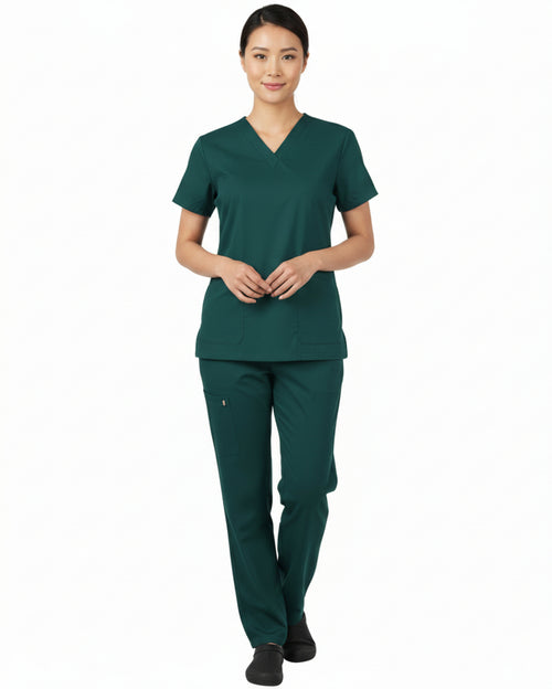 Green scrub set with shirt and pants on a white background