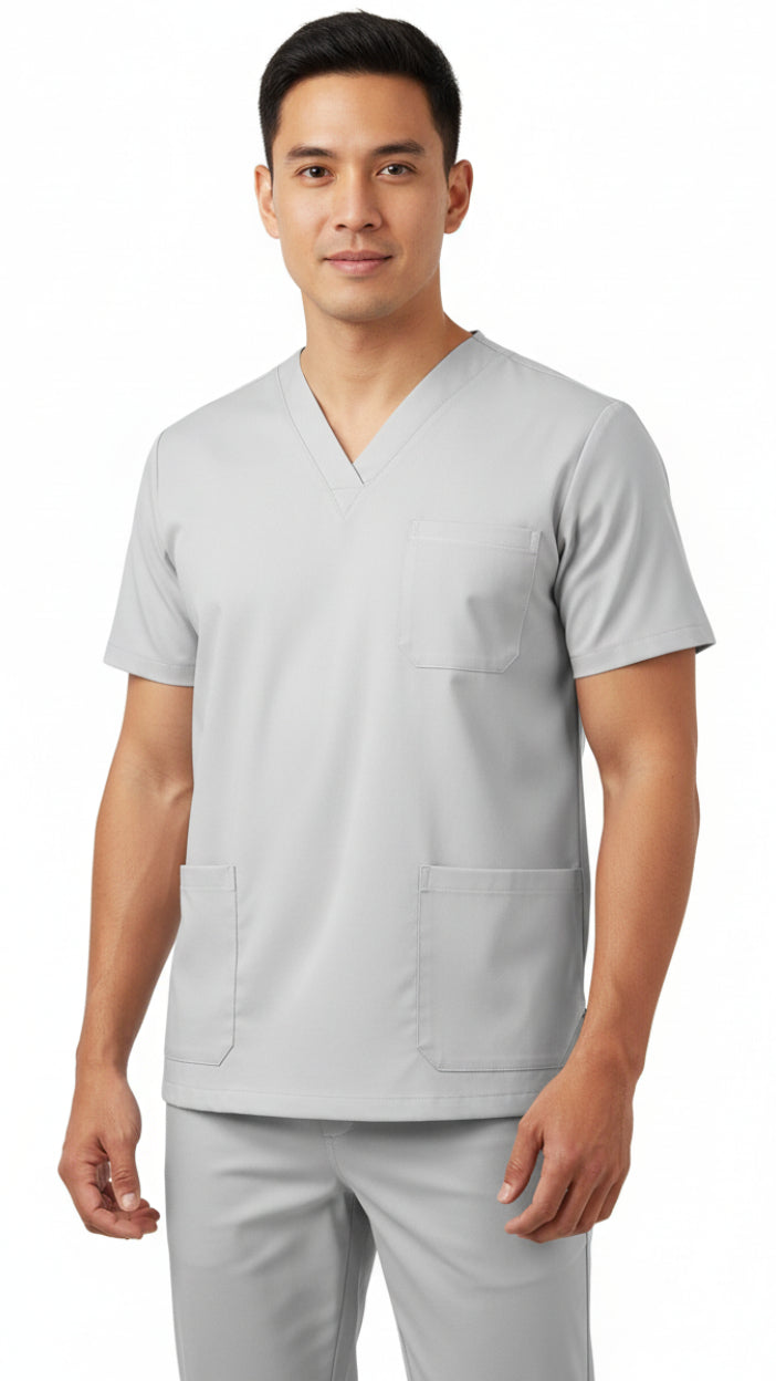 Gray scrub set with shirt and pants on a white background