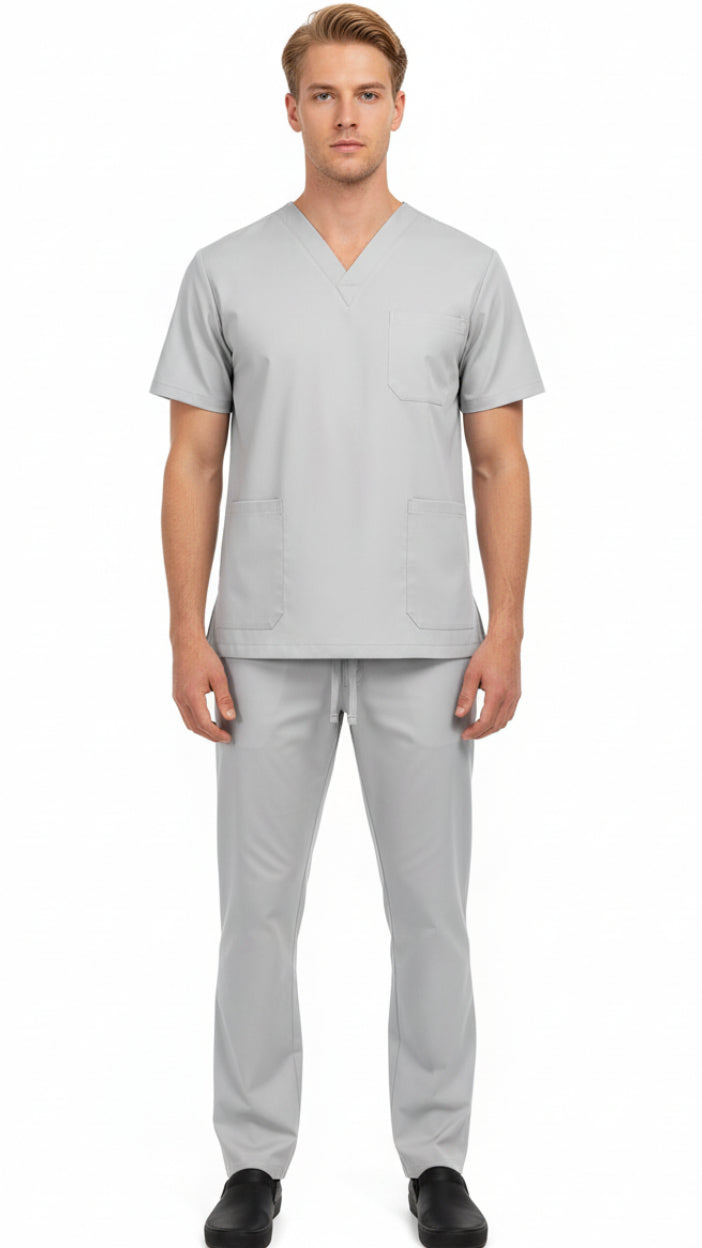 Gray scrub set with shirt and pants on a white background