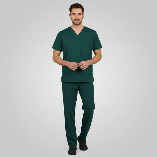 Green scrub set with shirt and pants on a white background