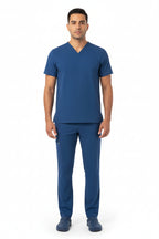 Nurse modeling Puisis Premium Scrubs in a vibrant cobalt blue color, premium medical uniform for healthcare workers, durable and fashionable scrubs