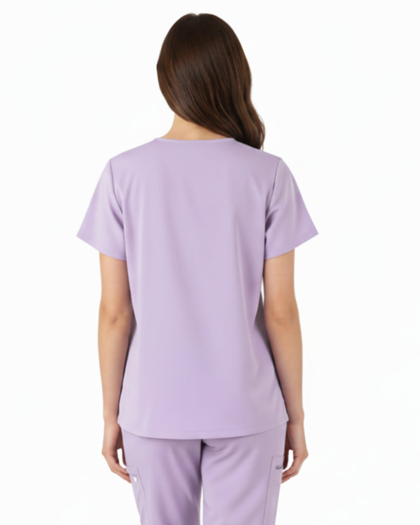 Lavender scrub set with top and pants on a white background