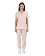 Pink scrub set with top and pants on a white background