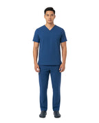 Healthcare professional wearing Puisis Premium Scrubs in cobalt blue color, modern medical uniform for nurses and doctors, comfortable and stylish hospital scrubs.
