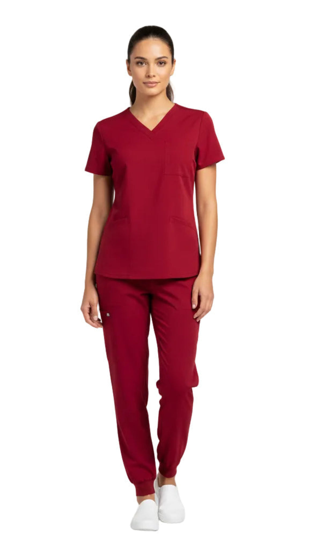 Female model in Heartbeat Crimson jogger scrub pants, front view