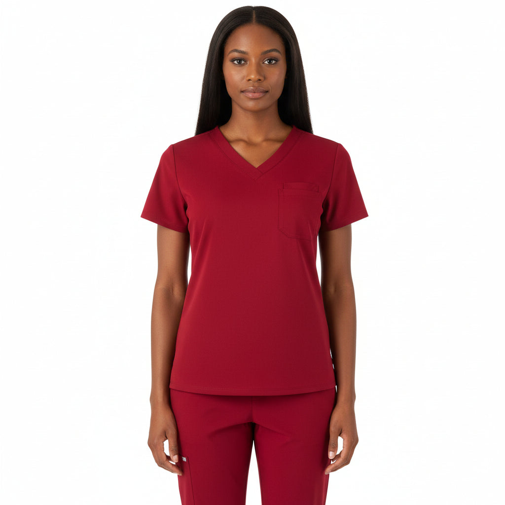 Female model in Heartbeat Crimson jogger scrub pants, front 