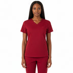 Female model in Heartbeat Crimson jogger scrub pants, front 