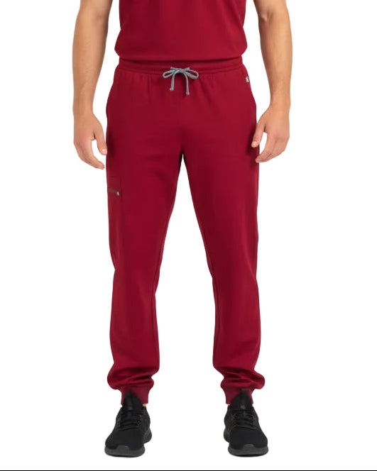 Back view of male model in Heartbeat Crimson jogger scrub front