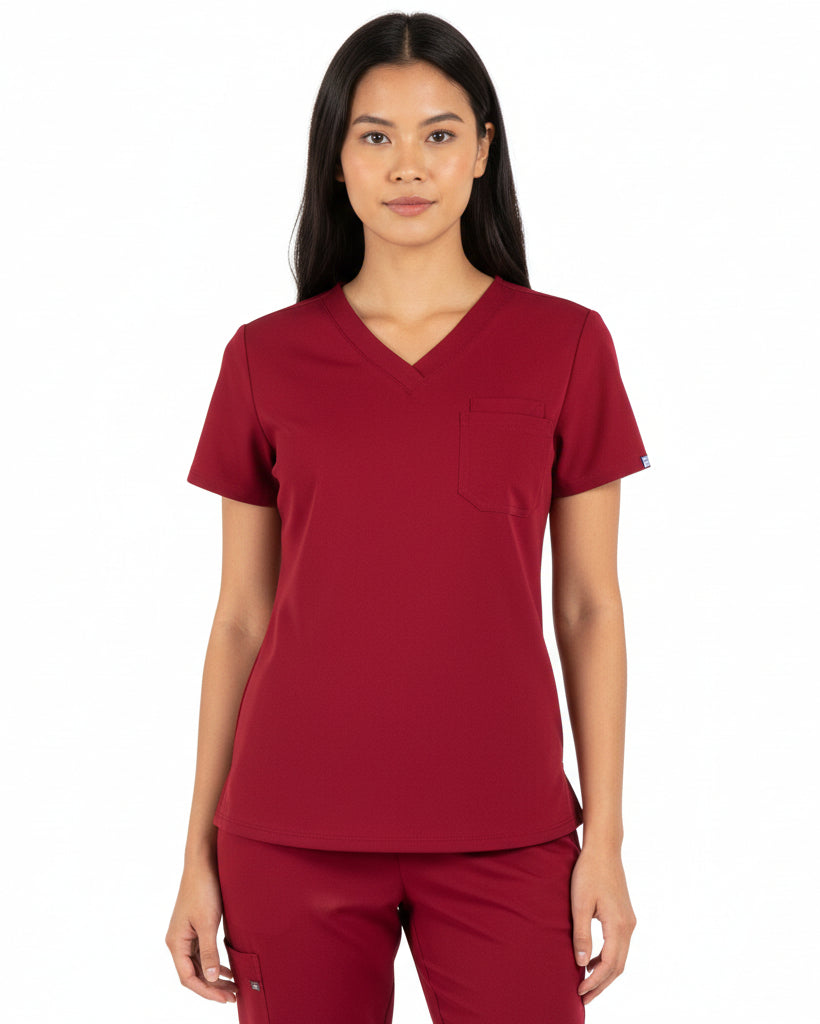 Female model in Heartbeat Crimson jogger scrub pants