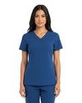 Radiology Tech dressed in cobalt blue Puisis Premium medical scrubs, breathable and professional nurse uniform for clinical settings