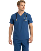 Full-body image of nurse in cobalt blue Puisis Premium Scrubs, modern hospital attire suitable for healthcare professionals