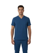 Front view of healthcare professional in cobalt blue Puisis Premium Scrubs, comfortable and stylish medical uniform for nurses and doctors.